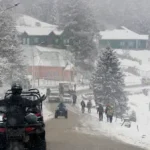 Snow dodges Kashmir plains, blankets higher reaches