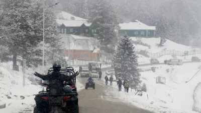 Snow dodges Kashmir plains, blankets higher reaches